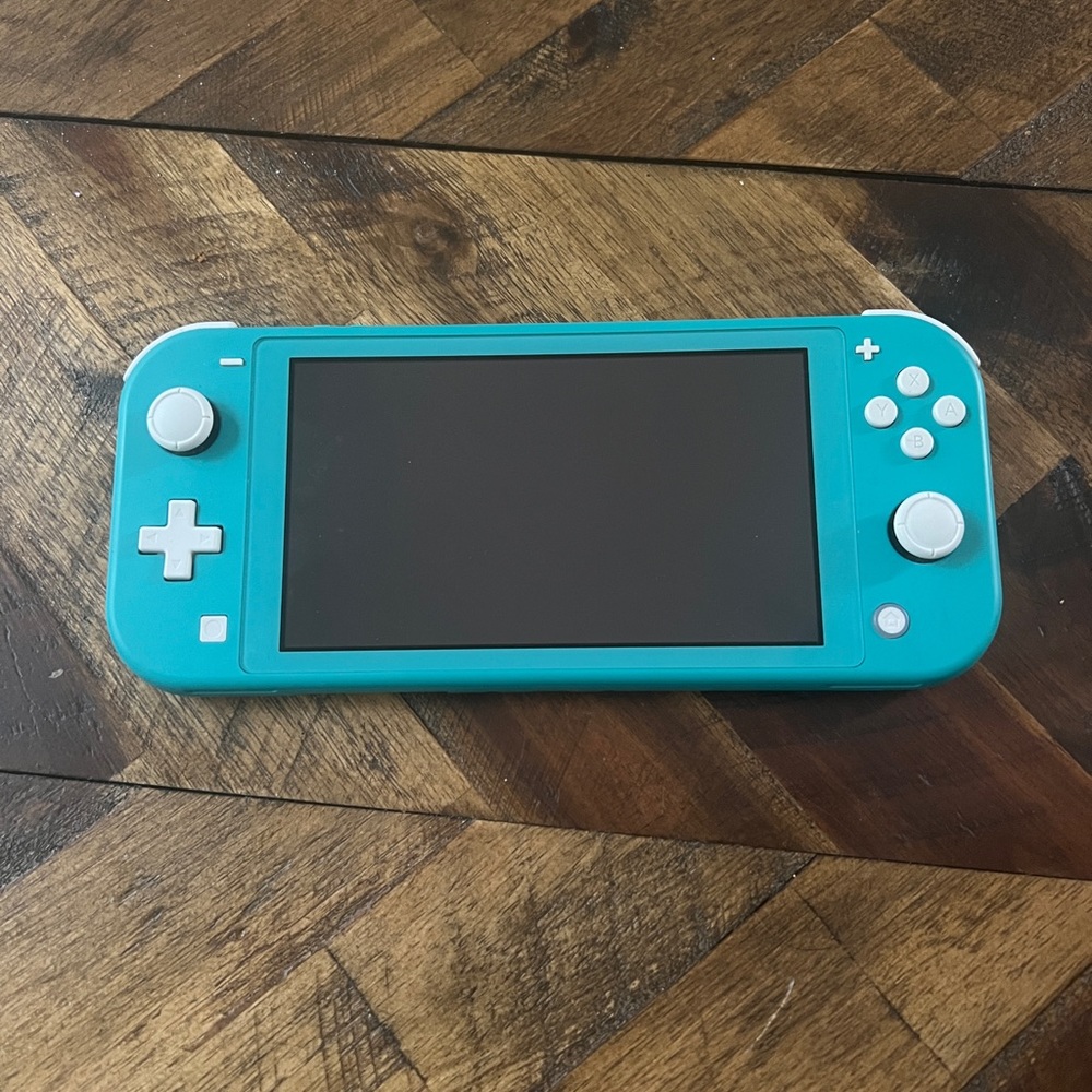 Nintendo Switch Lite with protective/carrying case, charger, and Animal Crossing